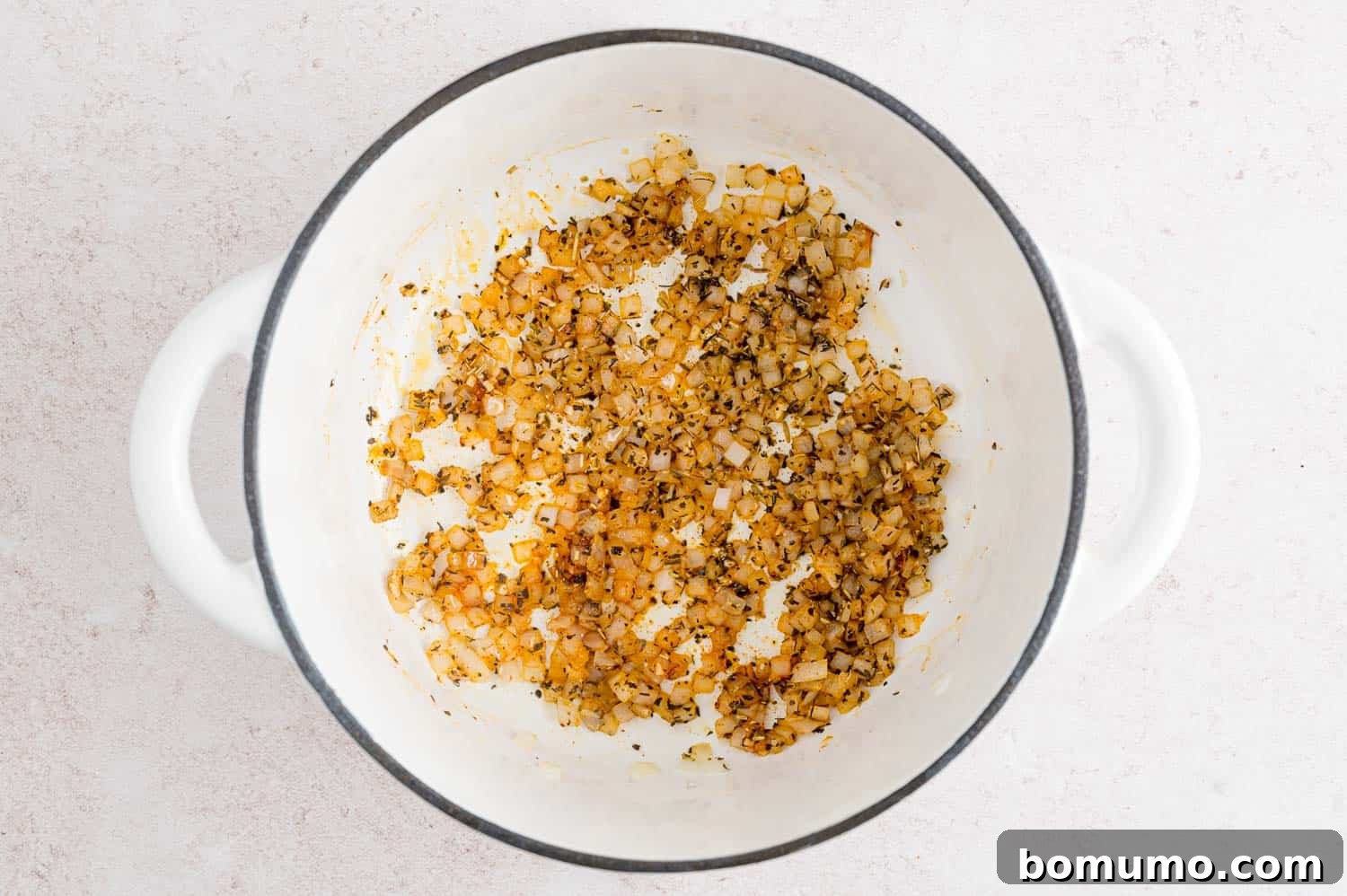 Herbs added to pan.