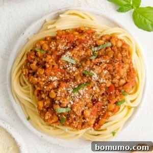 Vegan bolognese atop spaghetti.