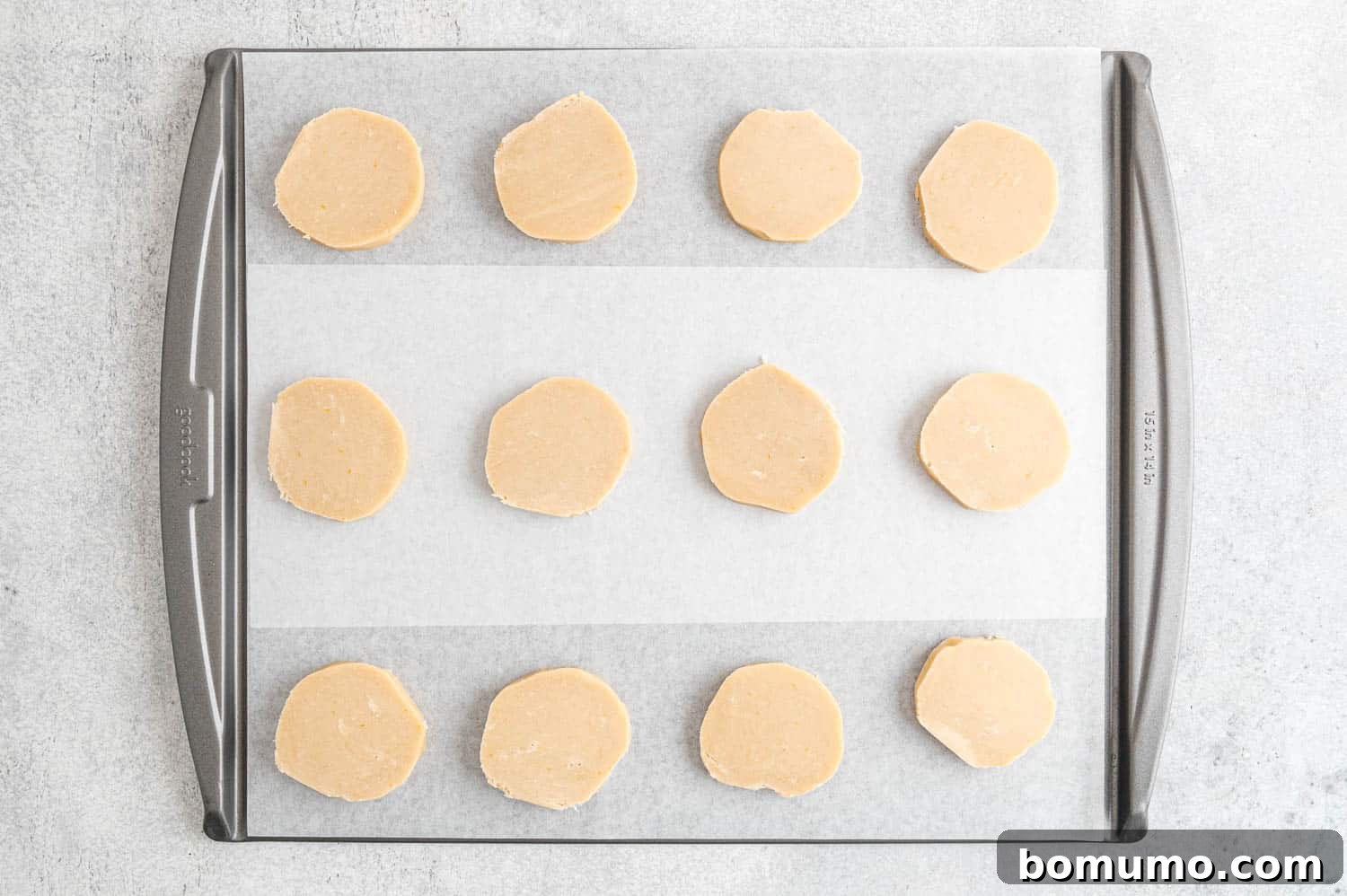 Unbaked cookies on pan.