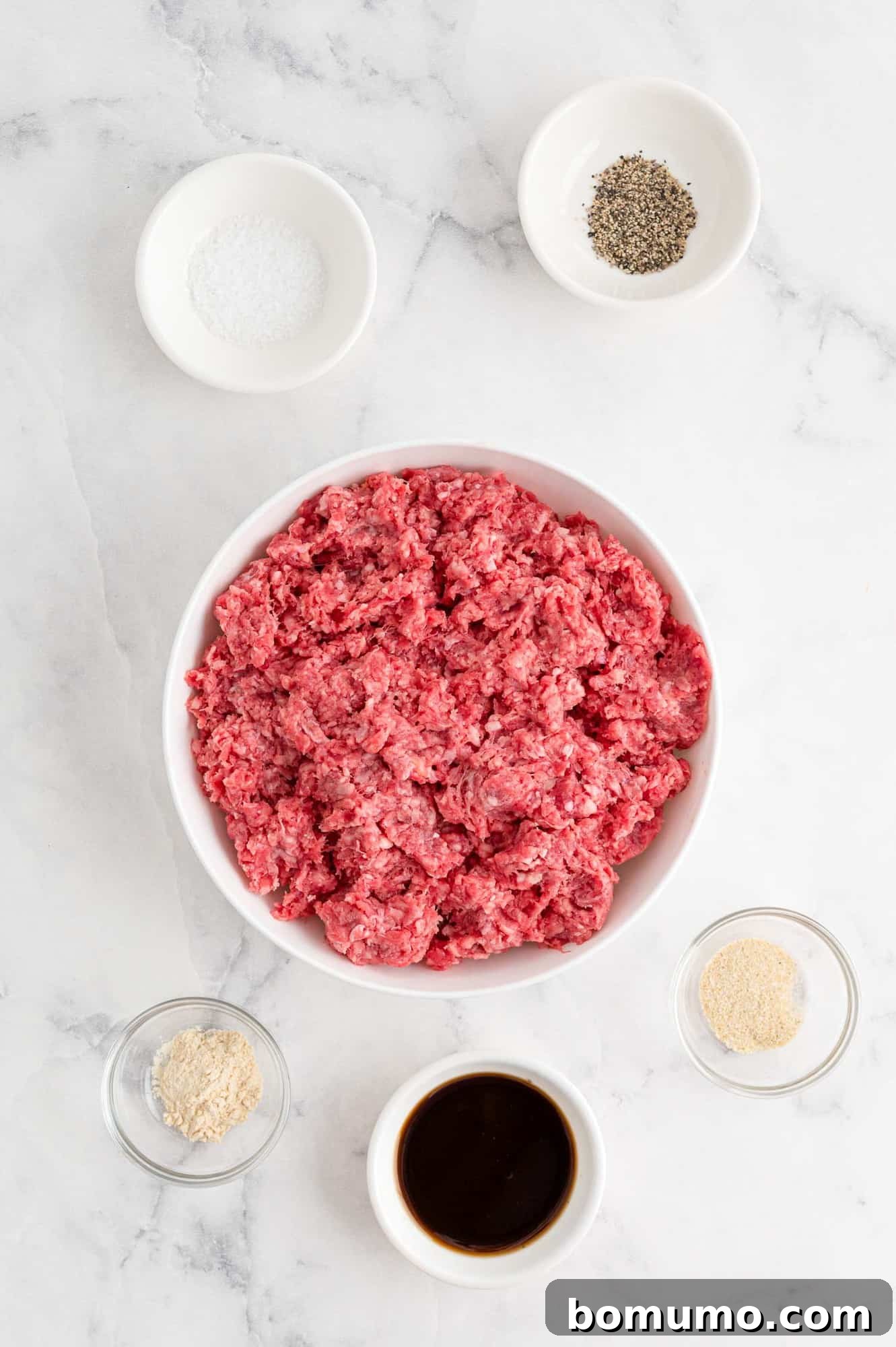 Ingredients needed to make air fryer hamburgers.