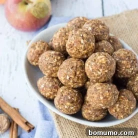 These apple cinnamon no bake energy bites are fun, filling, and could not be any easier to make. They're great for school lunch boxes, too! Get the easy and fun recipe on RachelCooks.com!