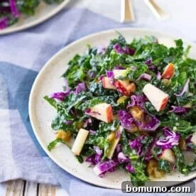 The perfect salad to keep in your fridge and grab at lunch time, this kale salad with apples and raisins is tangy, tart, sweet and full of flavorful nutrition. Get the recipe on RachelCooks.com!