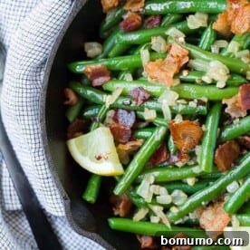 Flavorful green beans with bacon, garlic, and onion, a match made in heaven.
