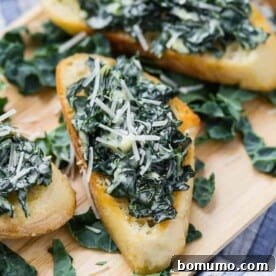Creamy kale bruschetta, also known as crostini, showcasing its rich, savory topping on toasted bread.