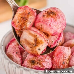Roasted radishes on a serving spoon.