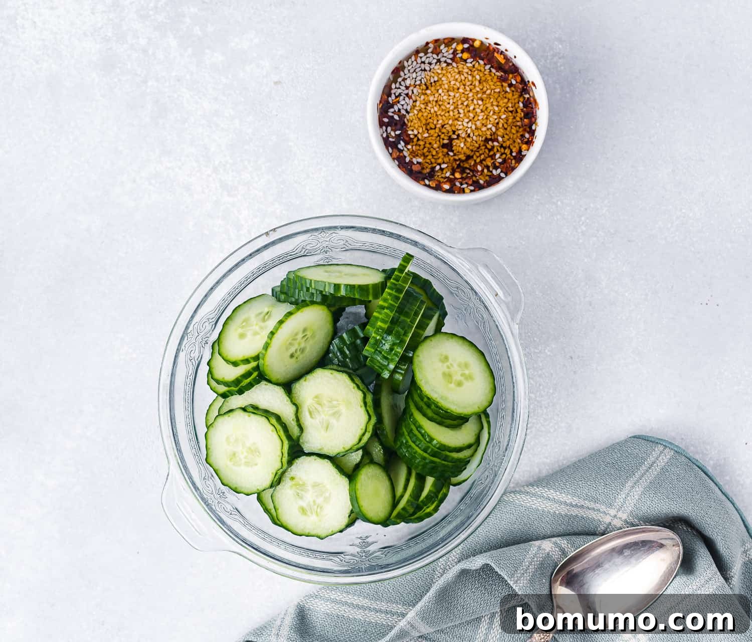 Sliced cucumbers in a bowl.