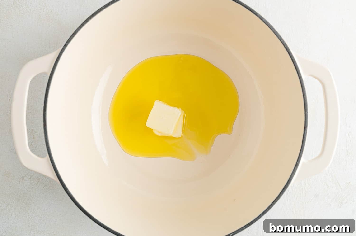 Caramelizing Onions: A Comprehensive Guide 6 Butter melting in a pan