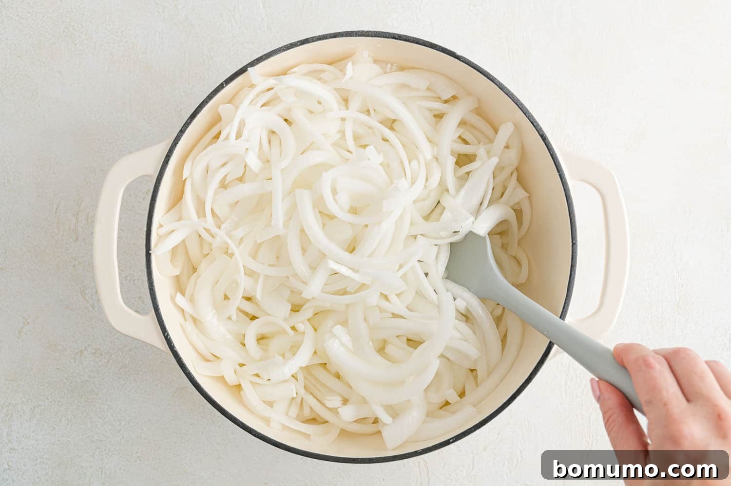 Caramelizing Onions: A Comprehensive Guide 7 Uncooked onions in dutch oven