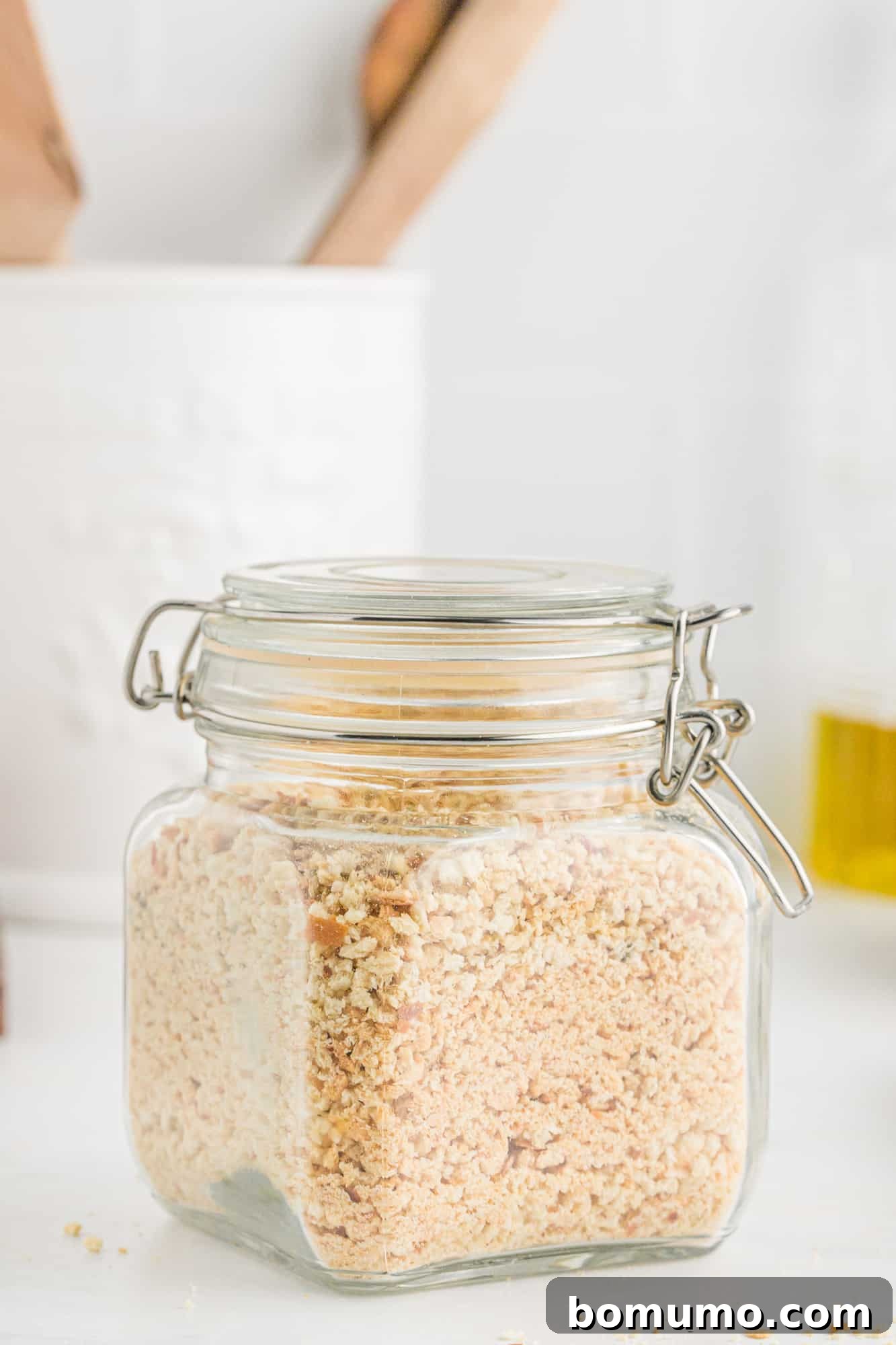 Bread crumbs in a small glass jar.