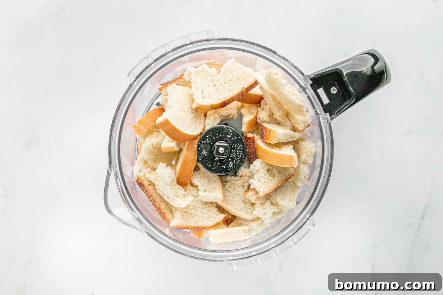 Bread pieces in a food processor.