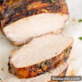 Thinly sliced, perfectly marinated balsamic chicken, sprinkled with fresh herbs for a gourmet and aromatic touch.