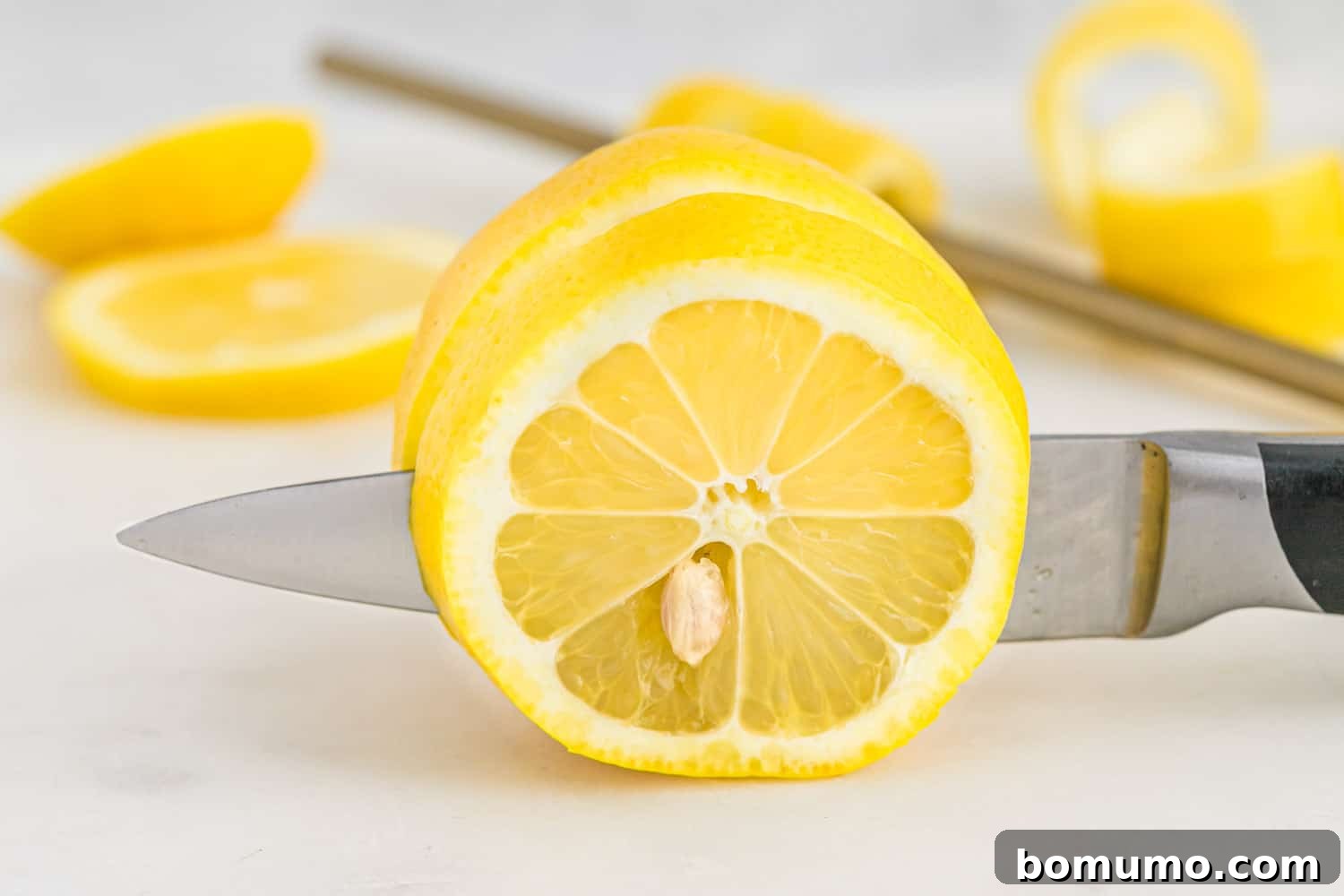 Lemon being sliced.
