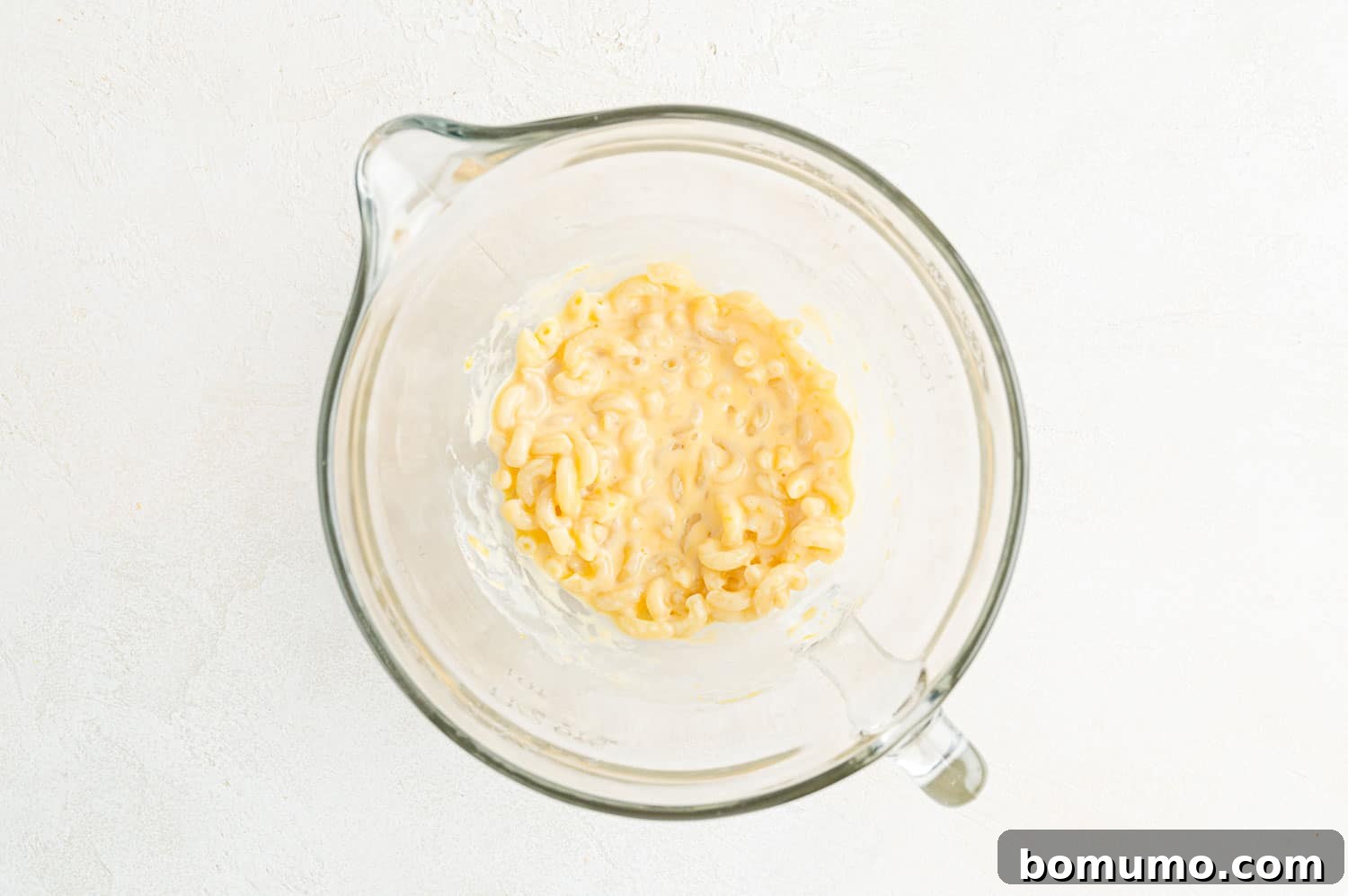 Macaroni and cheese immediately after adding cheese, before melting and stirring.