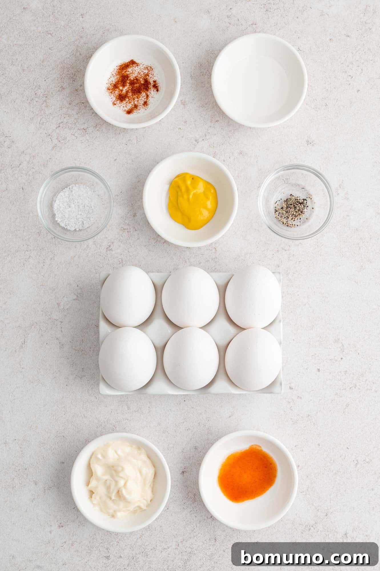 Ingredients needed for recipe including eggs, mustard, mayonnaise.