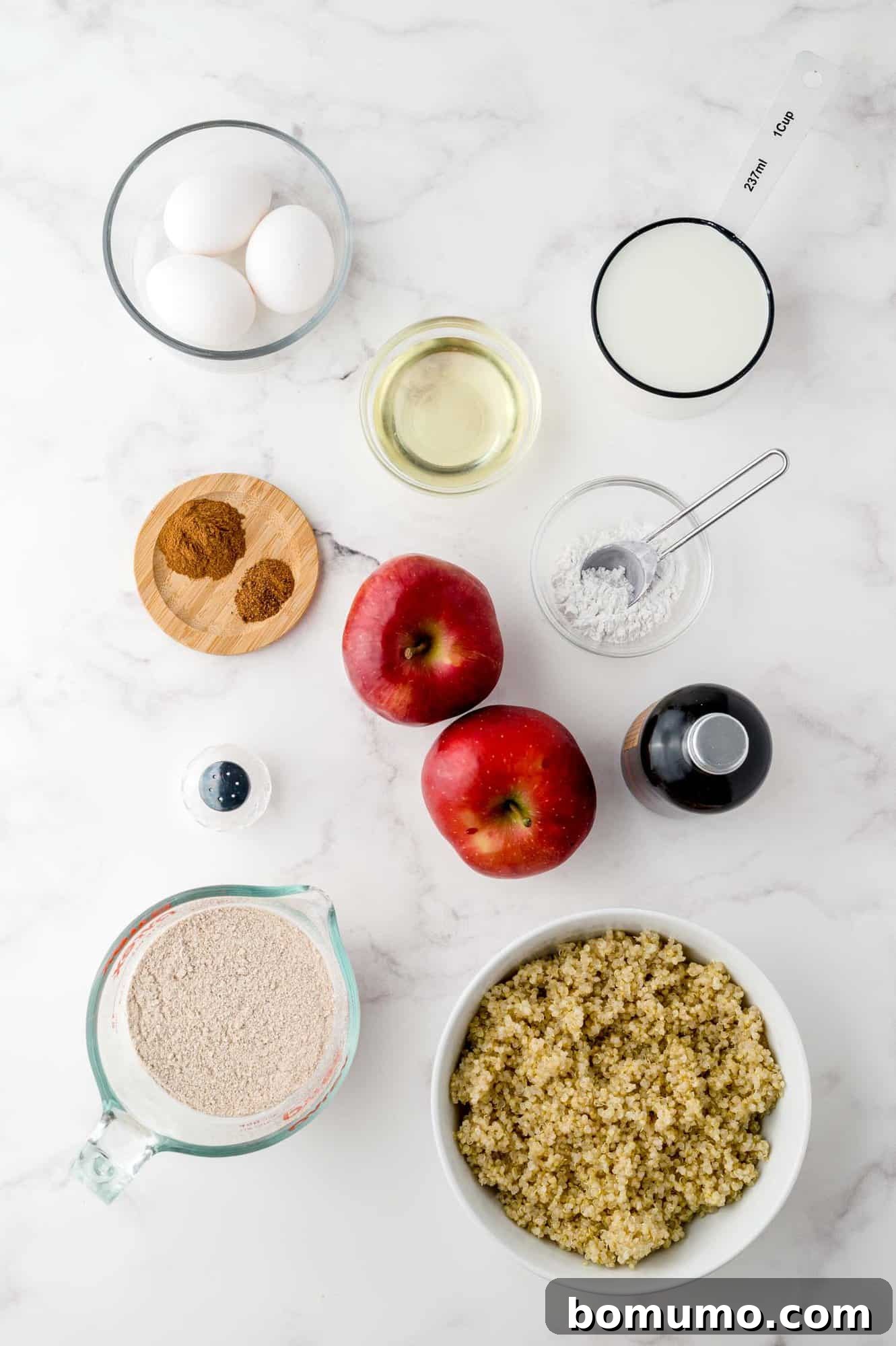 Overhead view of all ingredients meticulously arranged for the apple quinoa pancakes recipe.