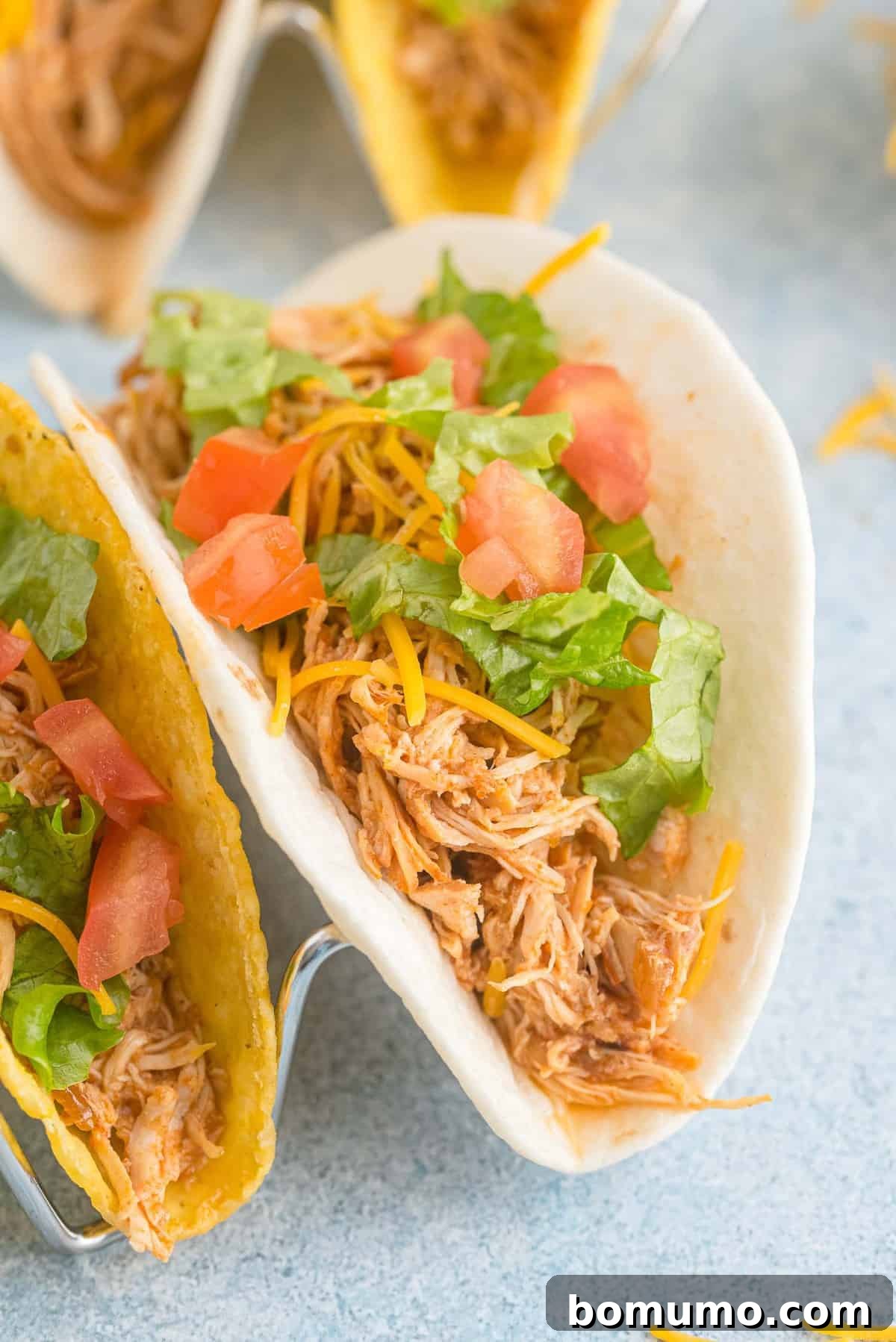 Chicken tacos on corn and flour tortillas.