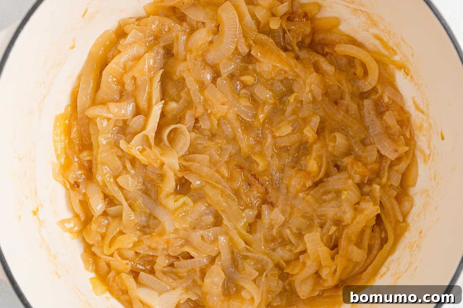 Deeply caramelized onions, golden brown and soft, ready for the next stage of soup making.