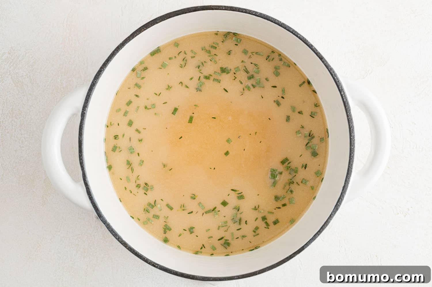 Herbs added to gravy.