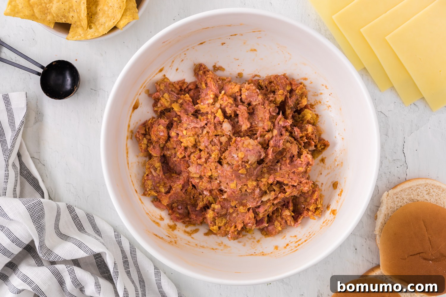 Burger ingredients mixed together.