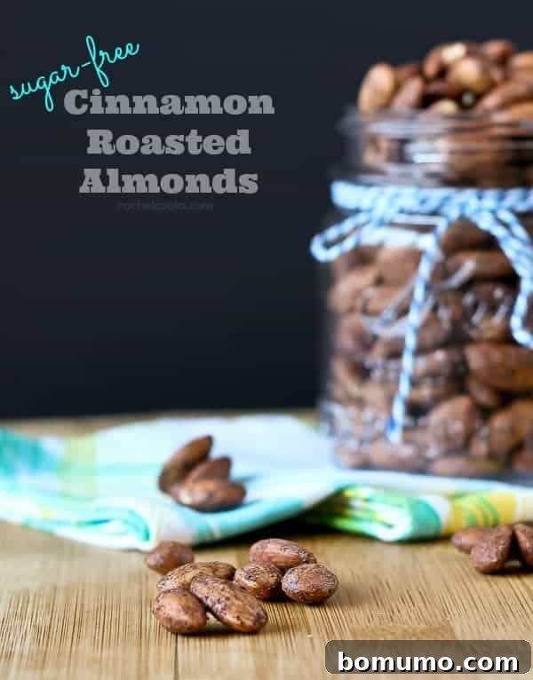 Zero Sugar Cinnamon Roasted Almonds 2 Almonds in a jar and on wooden surface. Delicious sugar-free cinnamon roasted almonds.