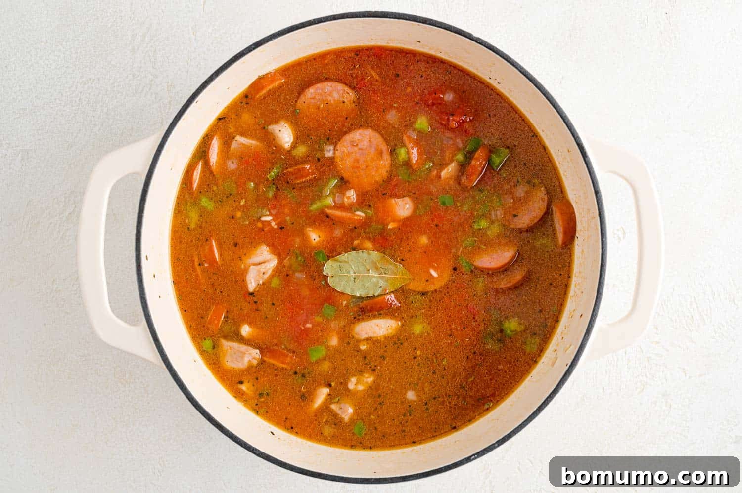 All ingredients added to pan except shrimp and okra.