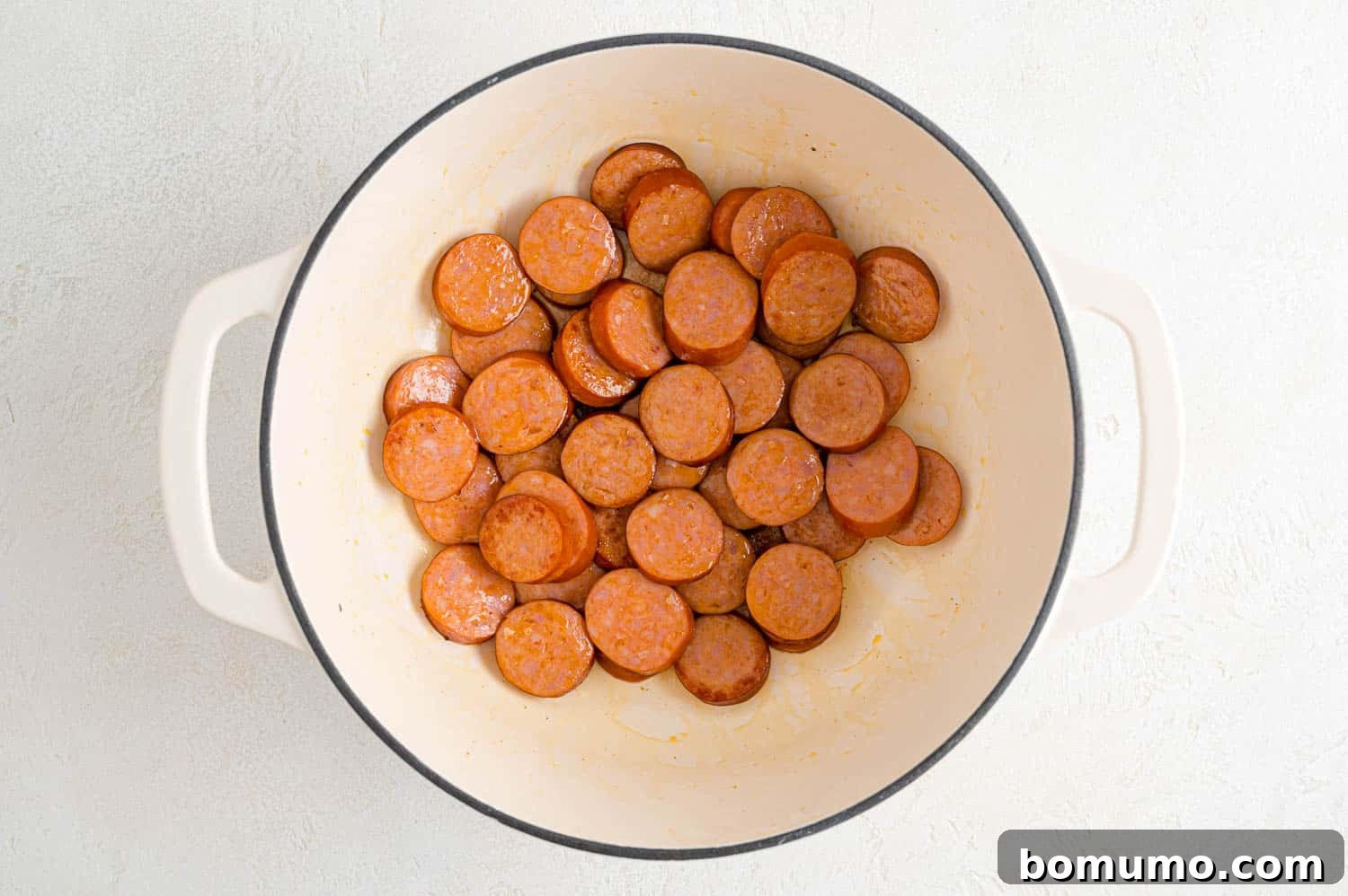 Sausage being browned.