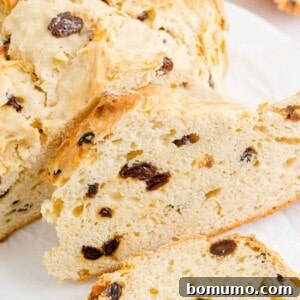 Sliced Irish soda bread with raisins.