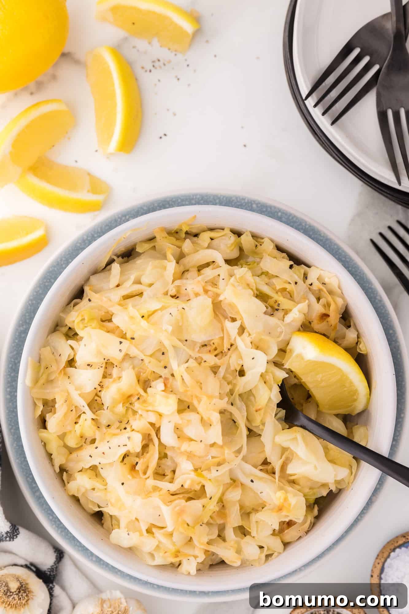 Sautéed Cabbage Reimagined 8 Cooked shredded cabbage in a large serving bowl.