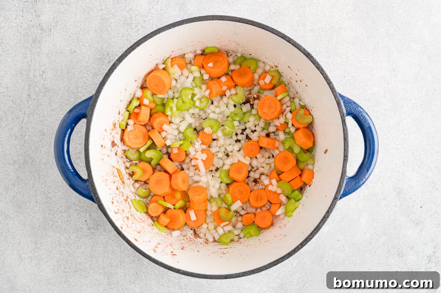 Vegetables added to pan.