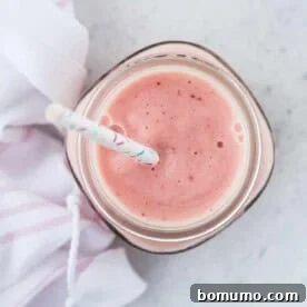 Overhead view of a tropical smoothie.