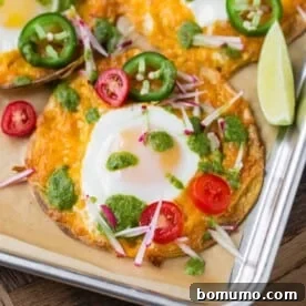 Sheet pan breakfast tostada with tomatoes, jalapeno, radish.