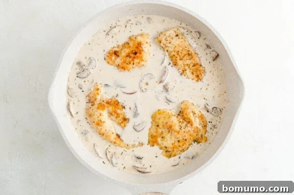 Perfectly pan-fried chicken cutlets carefully added back to the skillet with the creamy mushroom Marsala sauce.