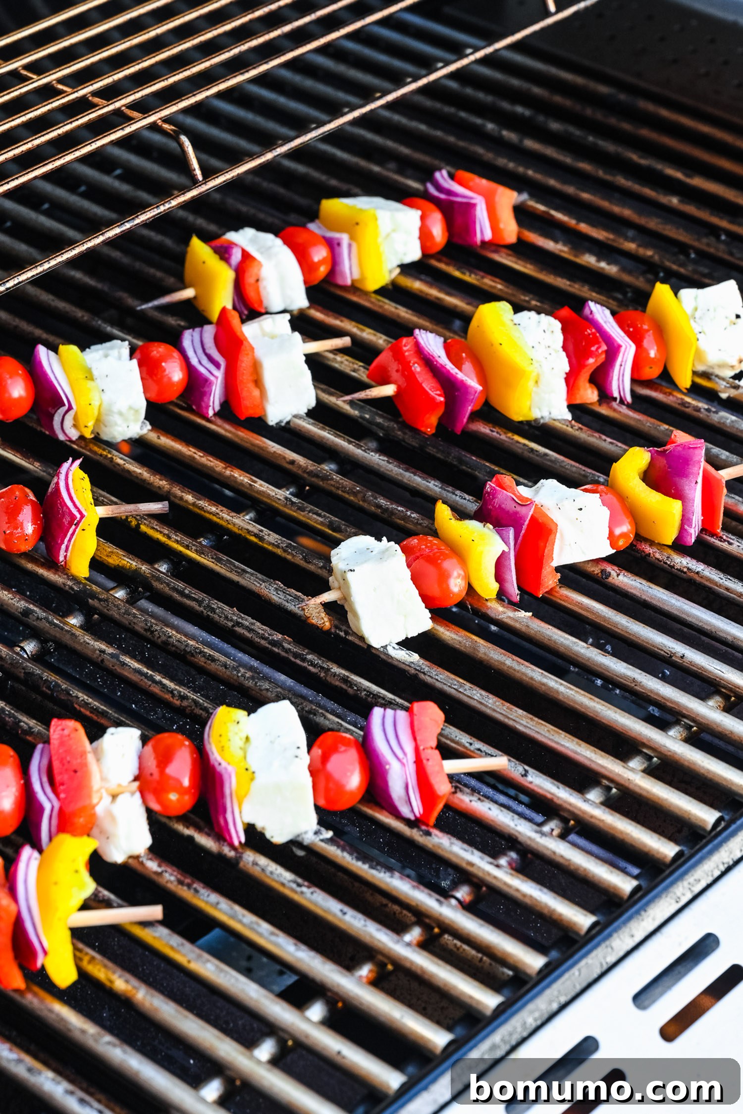 Halloumi on kebabs.