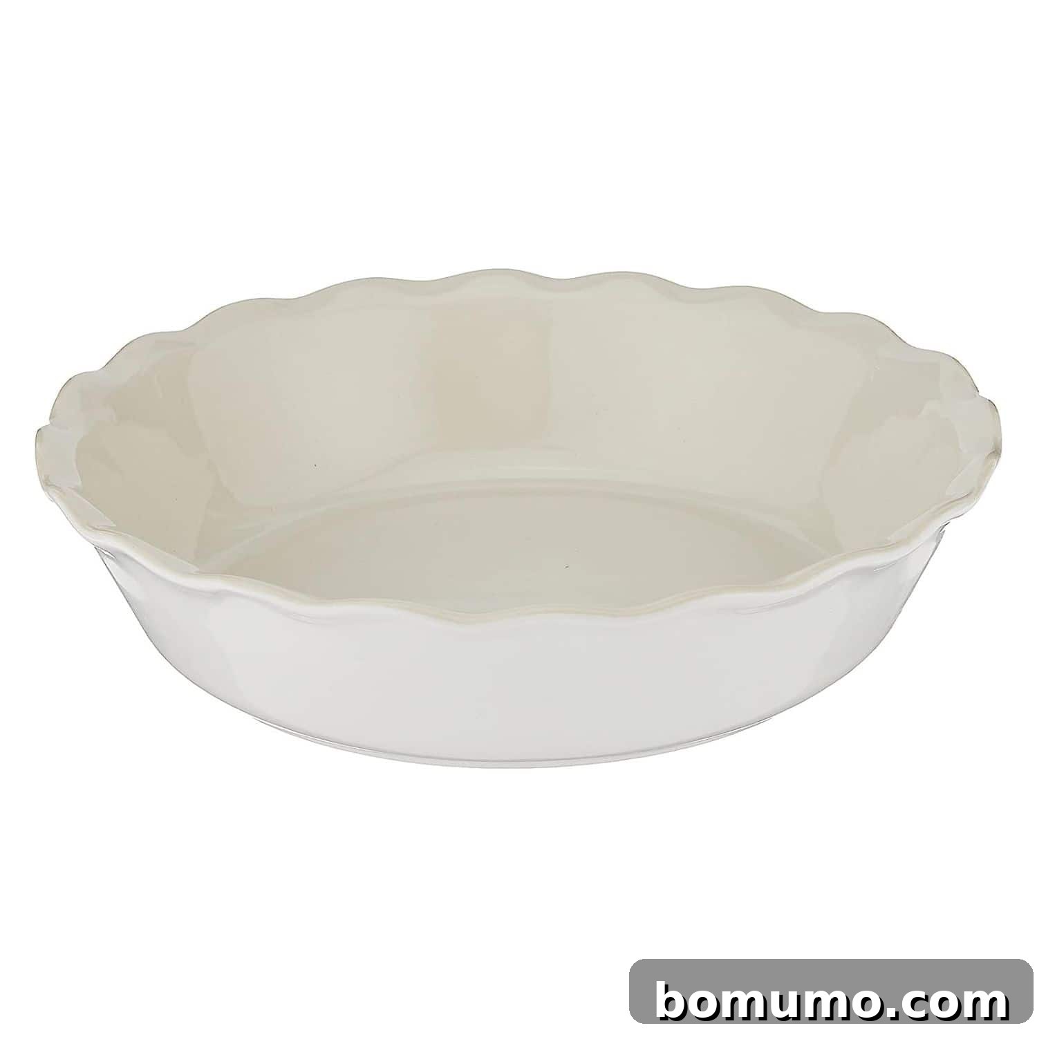 A pristine white deep-dish pie dish, ready for baking, featured prominently against a clean background. The dish is deep enough to accommodate generous fillings for quiches or pies, emphasizing its functionality.