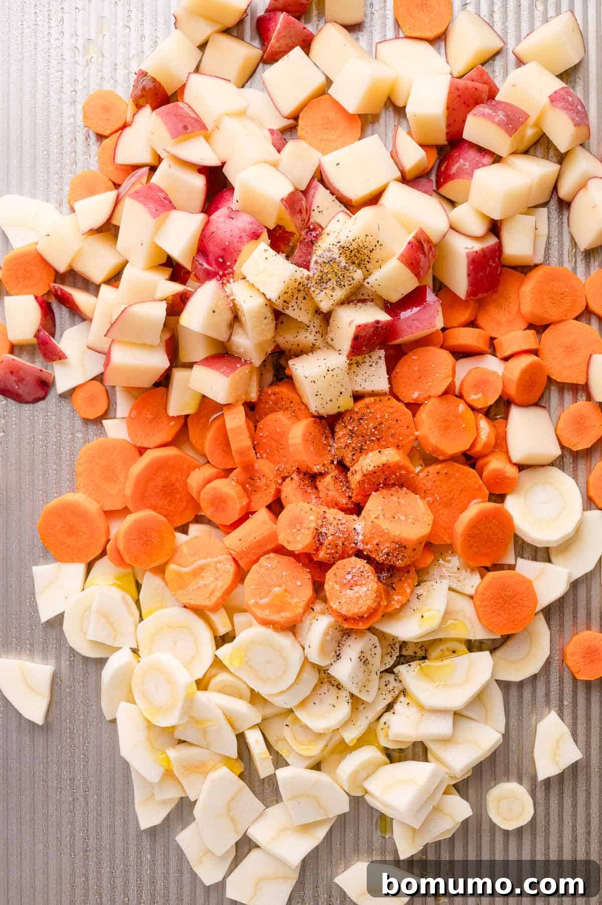 Seasoned Root Vegetables on a Baking Sheet