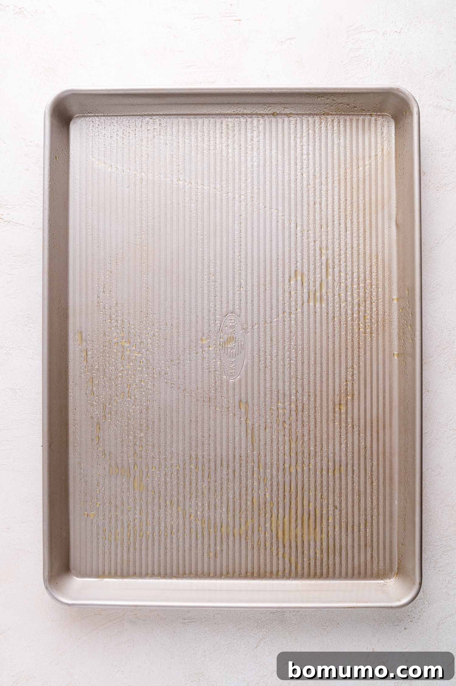 Sheet pan lightly coated with oil.