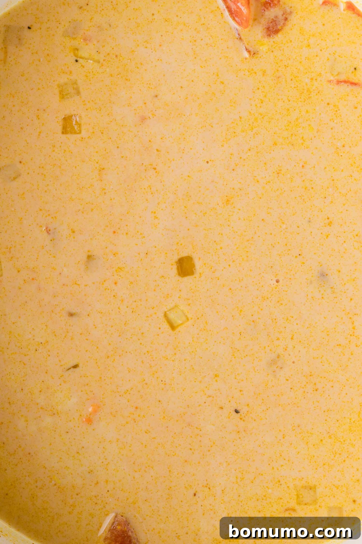 Red lentil curry simmering in the pot