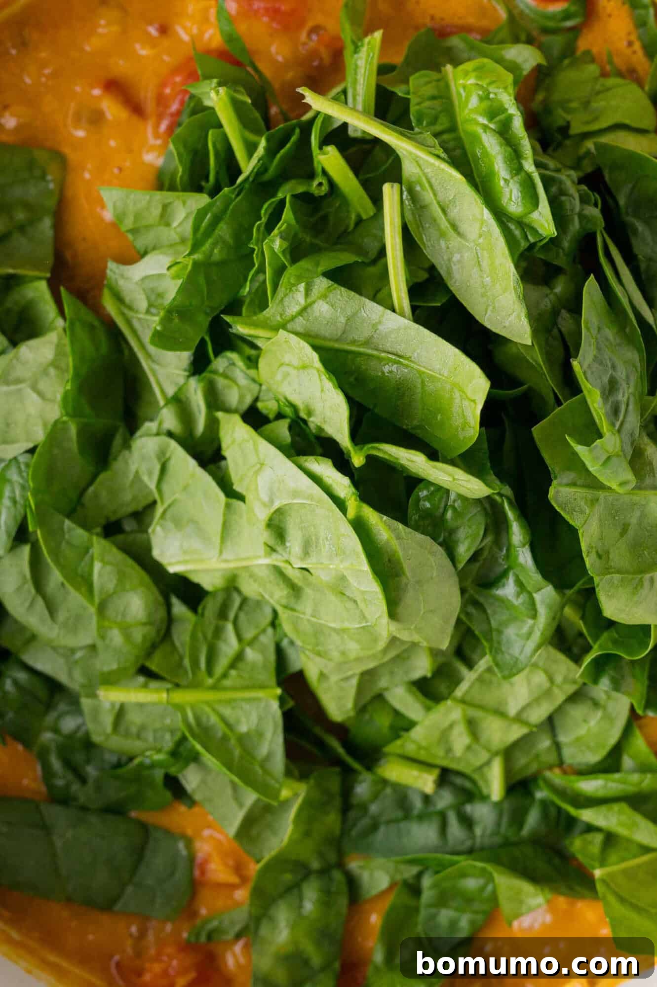 Adding spinach to red lentil curry