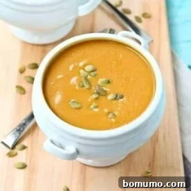 This Copycat Panera Bread Squash Soup tastes just like the original, but I made it a bit healthier! Get the easy fall soup recipe on RachelCooks.com!