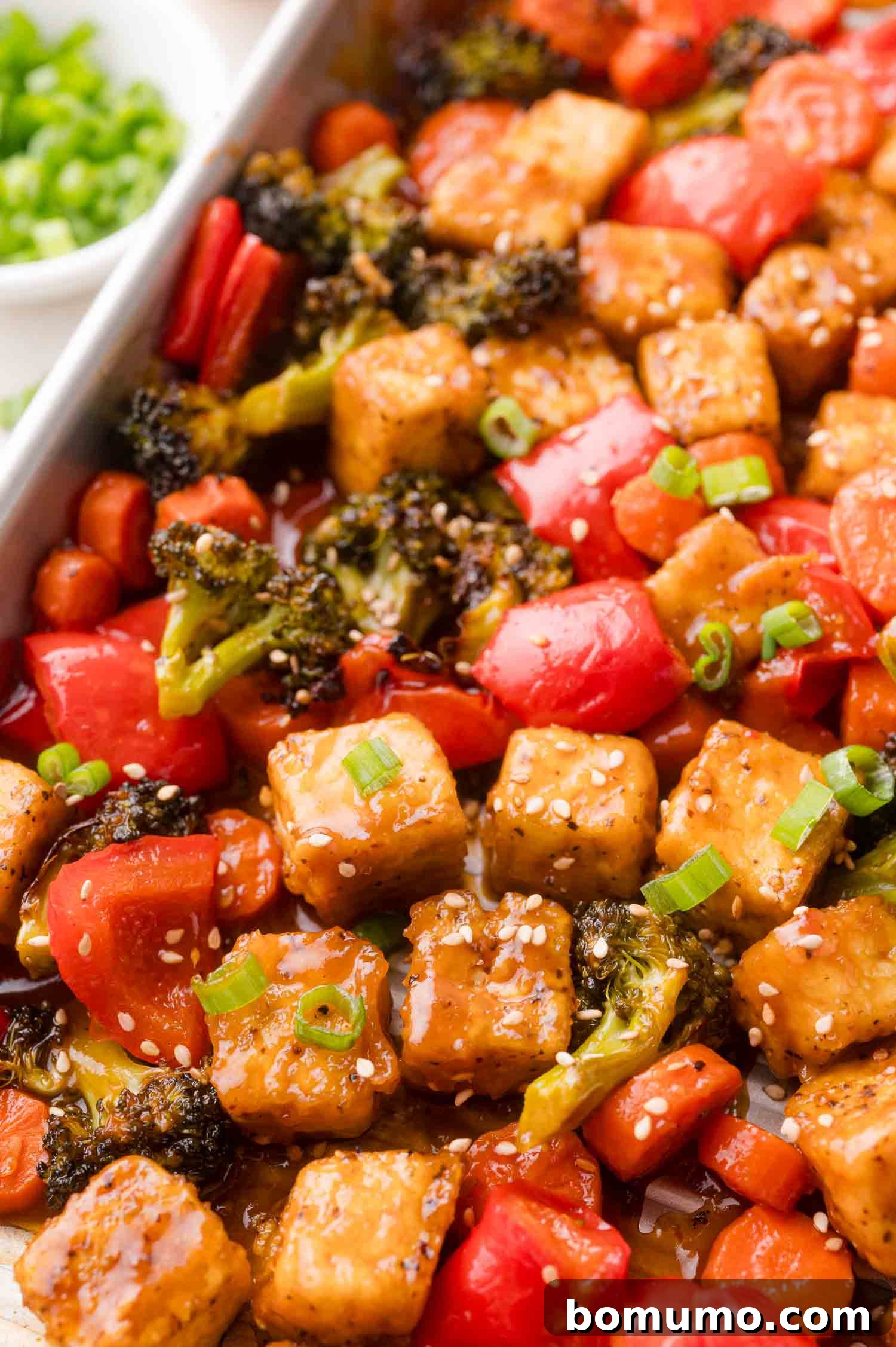 Close up of finished General Tso tofu and vegetables