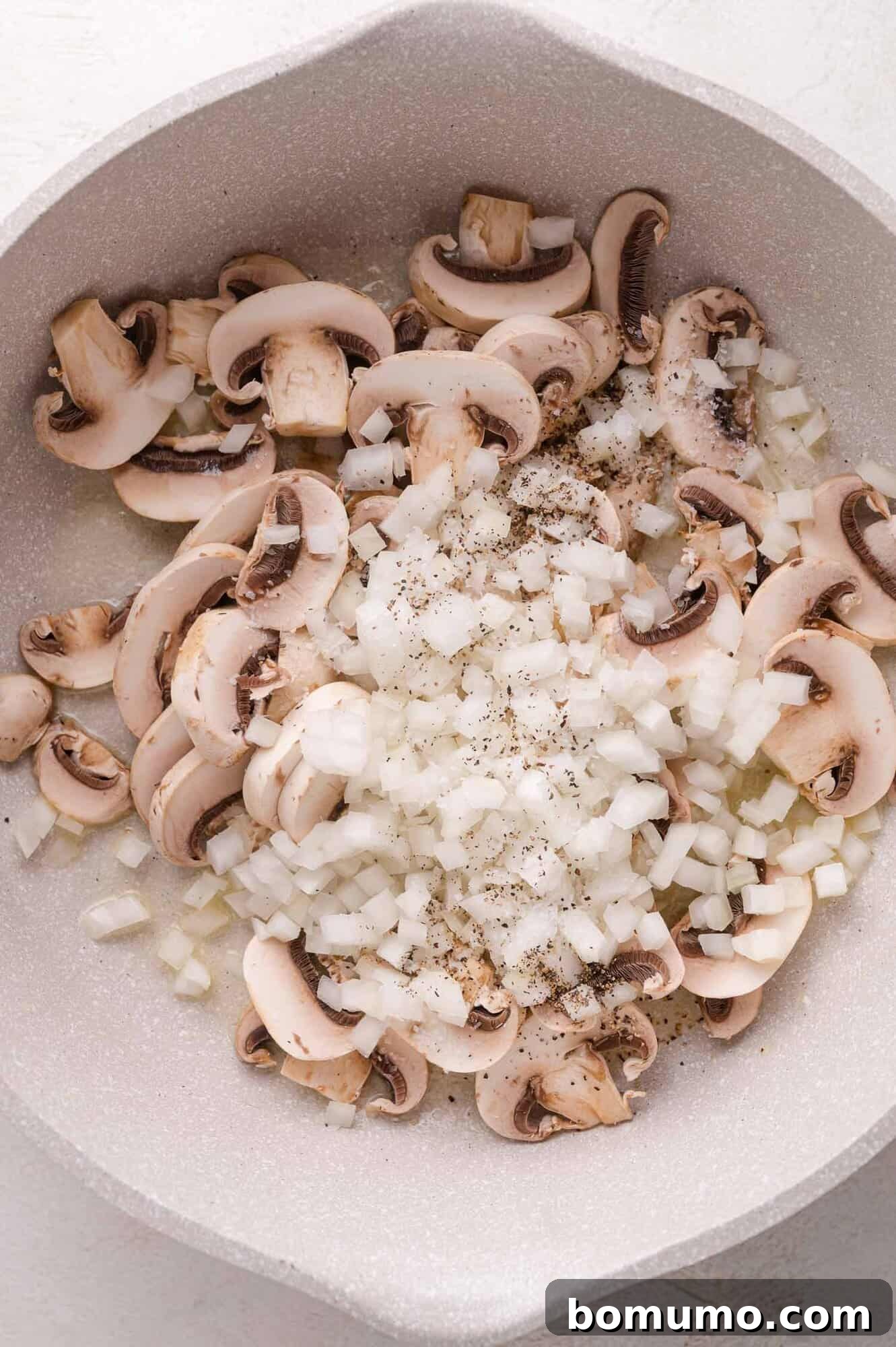 Cooking mushrooms and onions