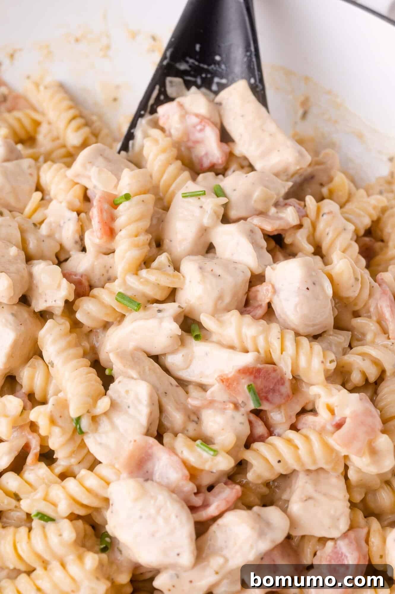 Creamy Chicken Bacon Ranch Pasta with chicken, bacon, and chives