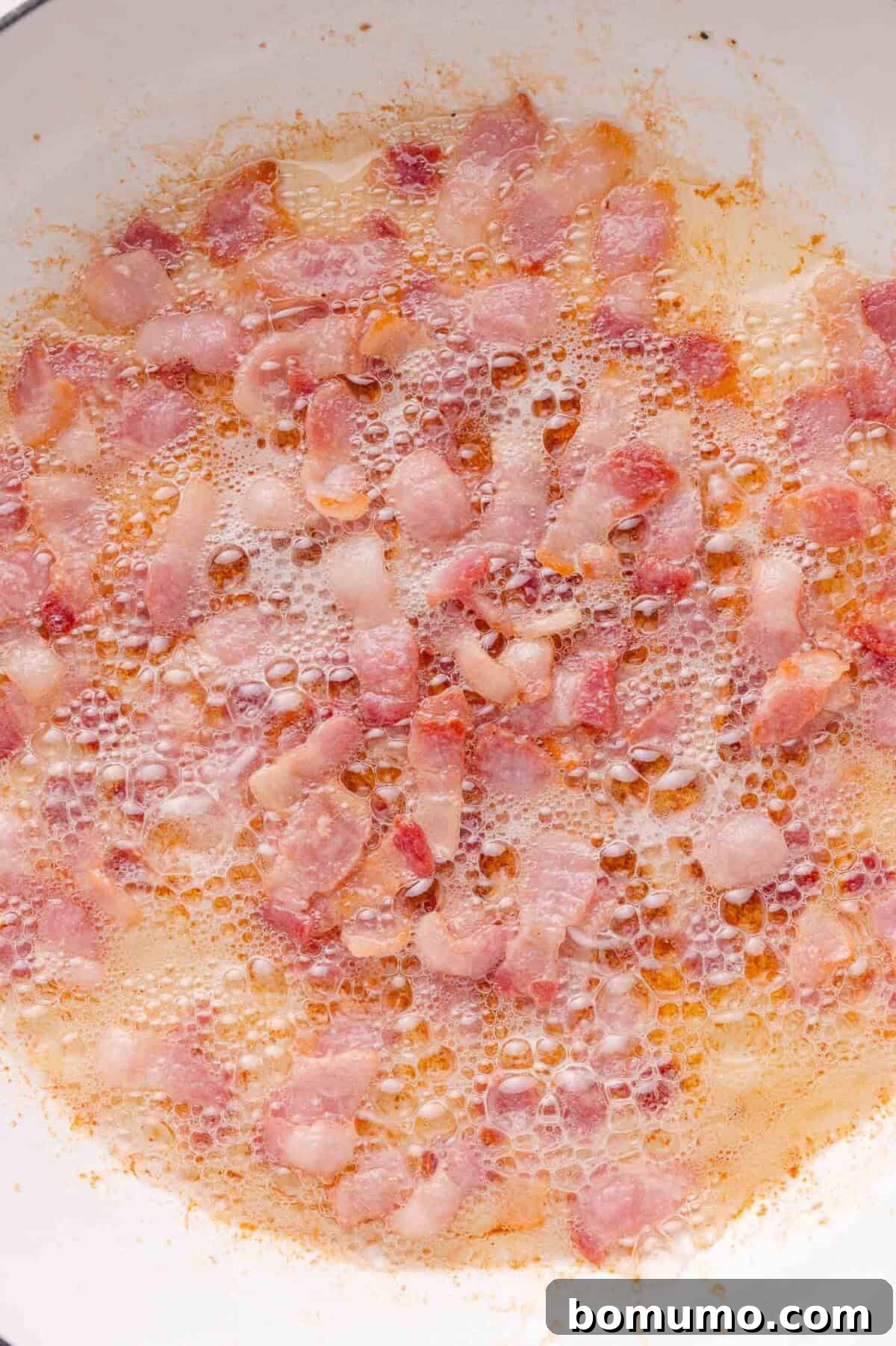 Bacon cooking in skillet