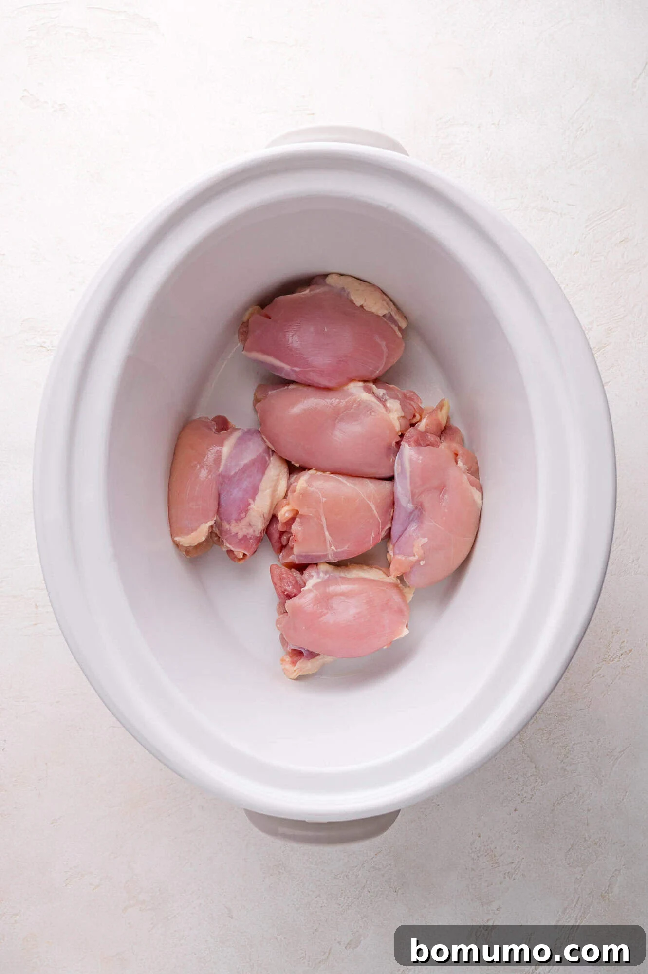 Raw chicken in a bowl