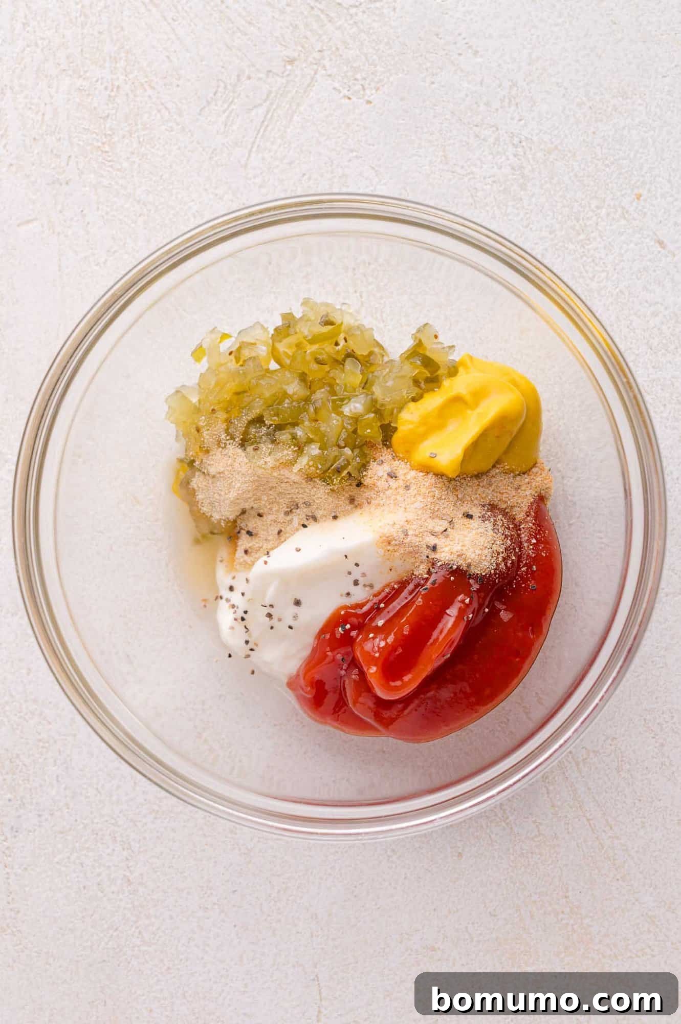 Ingredients for Big Mac Sauce in a bowl.
