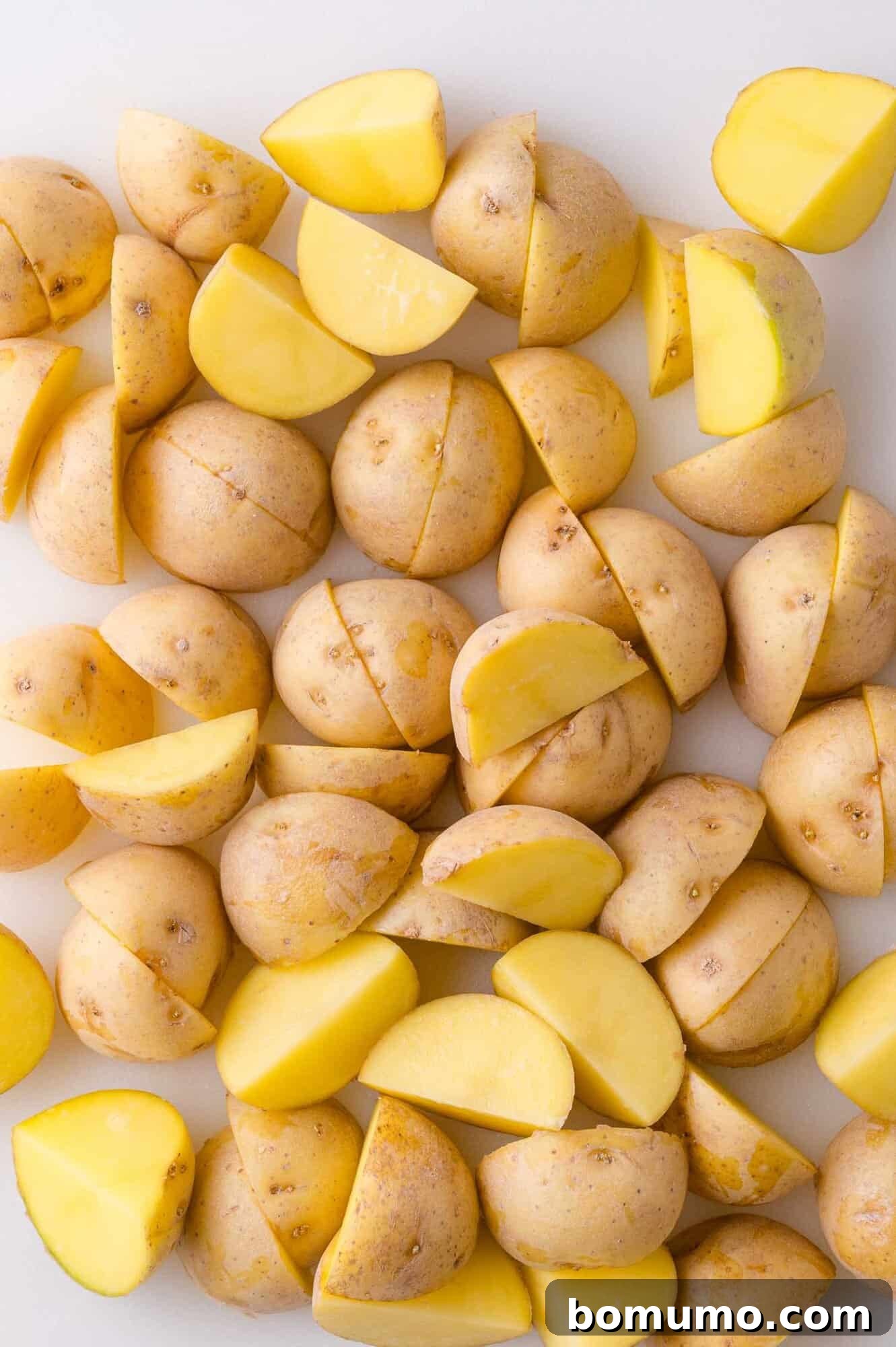 Cut potatoes before seasoning.