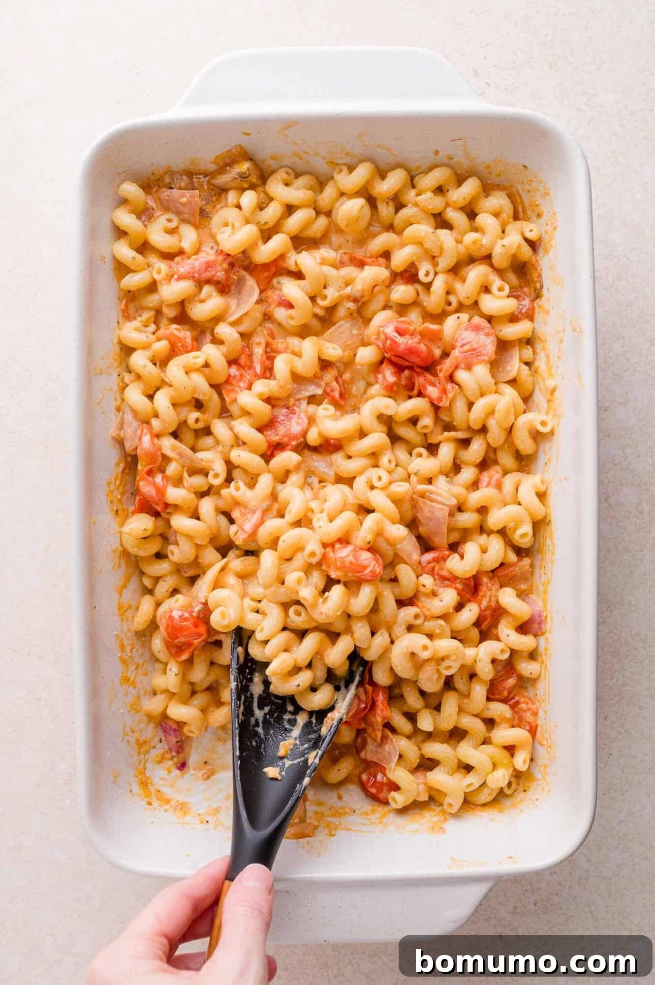 Stirring Pasta and Sauce