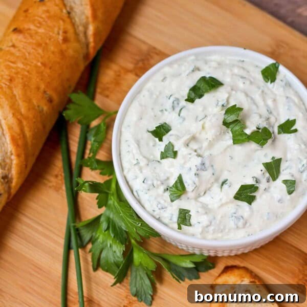 Herbed feta dip in a small white bowl.